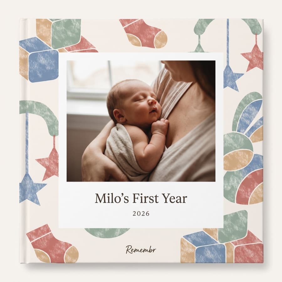 Year One — an 11×11 hardcover reading “Milo's First Year, 2026”